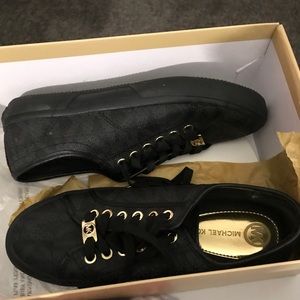 Women’s size 7 Michael Kors Fashion Sneakers